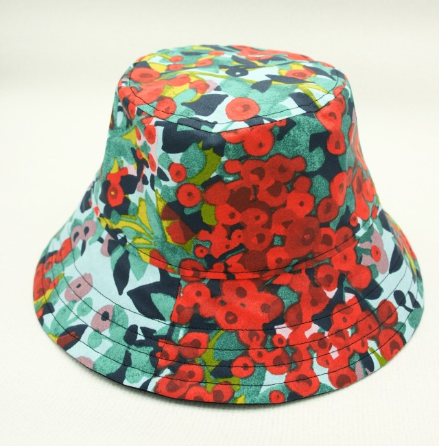 Chapeau de pluie pour femme en toile de coton enduite vert et rouge