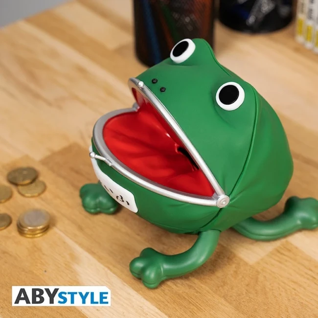 Vue de côté de la tirelire Gama-chan verte, bouche ouverte