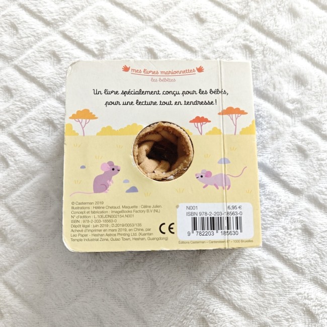 Quatrième de couverture du livre Simon le lion Casterman Dos du livre marionnette Simon le lion Casterman, informations d’édition et marionnette visible