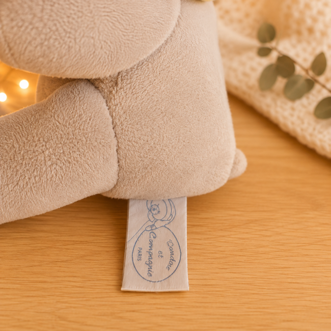 Petit doudou beige – Étiquette Doudou et Compagnie Étiquette Doudou et Compagnie sur petit doudou beige de seconde main