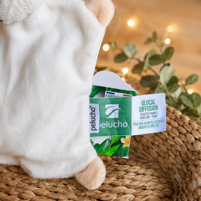 Étiquette du doudou bouillotte Pelucho fabriqué en France gros plan
