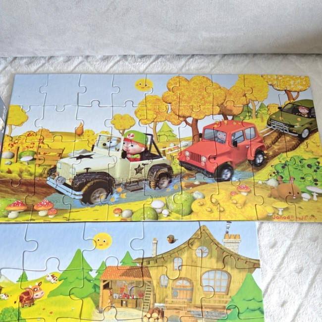 Puzzle Janod Les 4x4 de Jack – illustration complète Puzzle Janod Les 4x4 de Jack – illustration forêt et campagne, pièces complètes, état impeccable