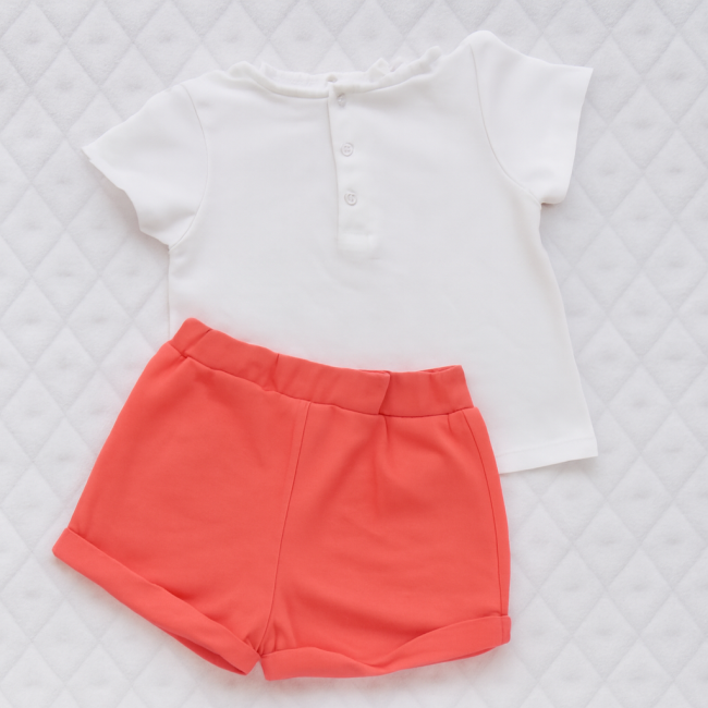 Vêtement bébé 12 mois vue de dos - seconde main – t-shirt blanc à col volanté et short corail à revers