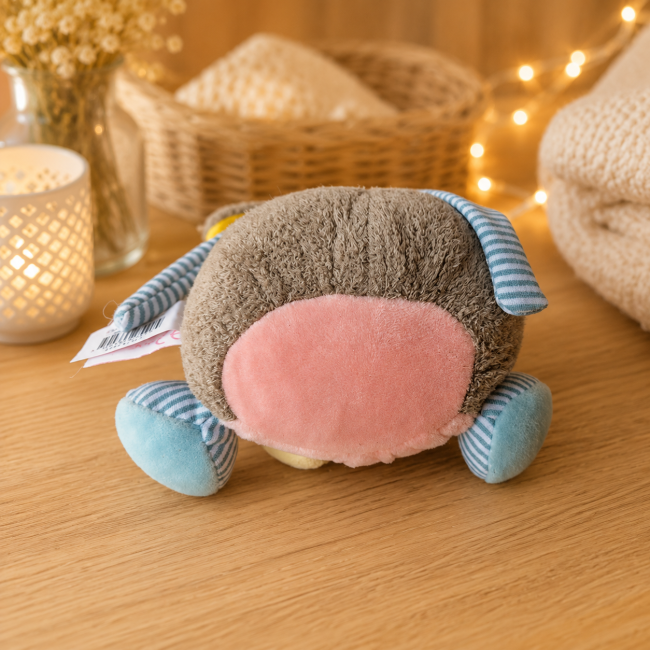 Dessous de la boîte à musique lapin en peluche de seconde main