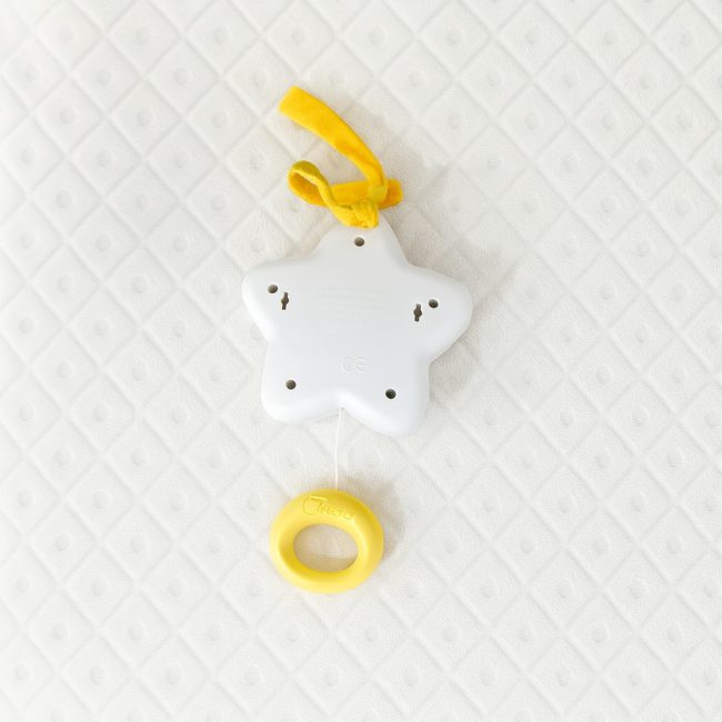 Boîte à musique étoile Chicco vue de dos, seconde main en bon état