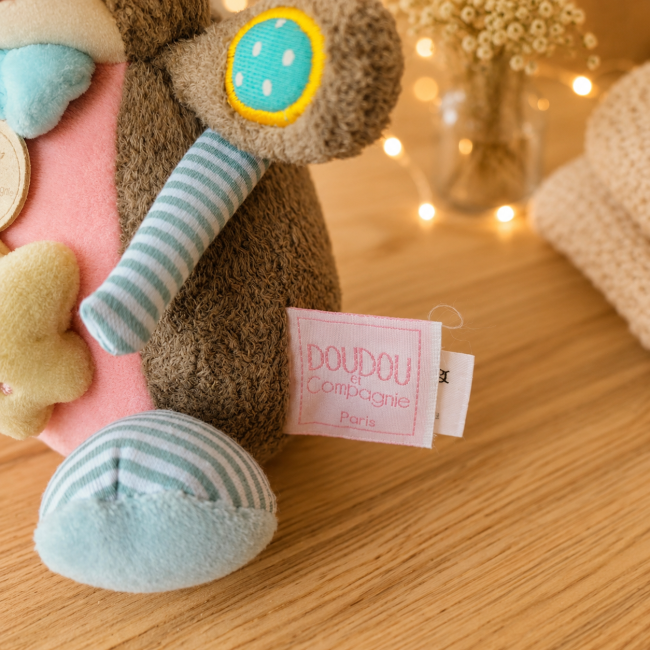 Étiquette Doudou et Compagnie de la boîte à musique lapin de seconde main