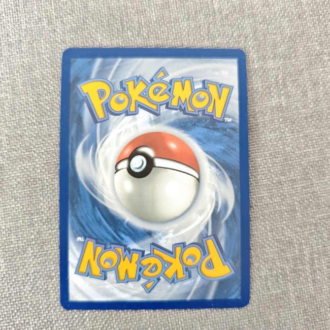 Carte Pokémon – Dos officiel – Excellent état Dos officiel d’une carte Pokémon, seconde main, excellent état