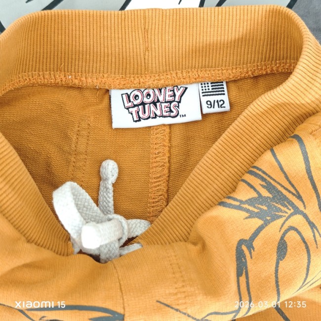 étiquette Looney Tunes short orange bébé 9‑12 mois