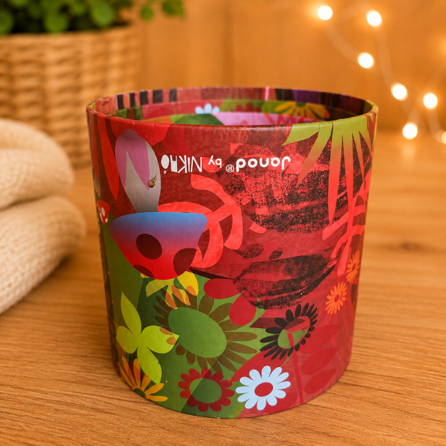Boîte cylindrique Janod colorée avec motifs de fleurs et animaux