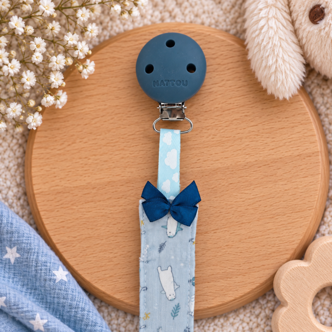 Attache sucette bleu ciel avec nœud bleu marine et clip silicone
