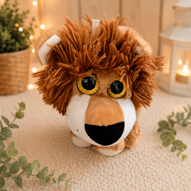 Lion en peluche Sandy – gros plan sur les yeux