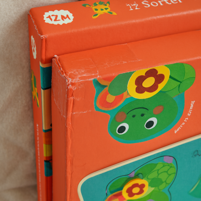 Boîtes DJECO Croc-carrot – jouet seconde main avec coins réparés