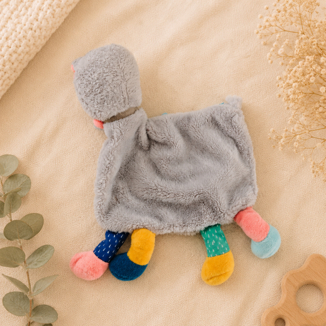 Dos du doudou lama gris multicolore bébé seconde main