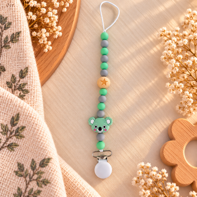 Attache-sucette artisanale koala vert menthe et gris – Silicone et bois naturel