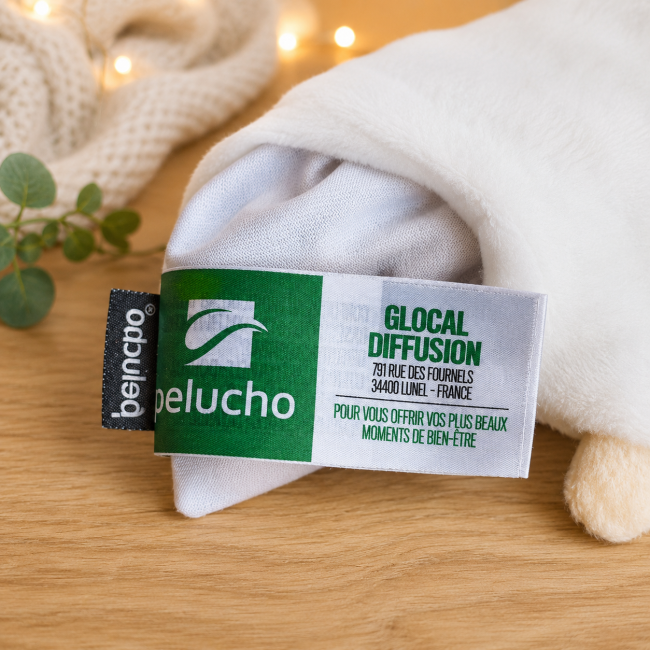 Étiquette intérieure du doudou bouillotte Pelucho avec informations fabricant