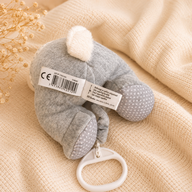 Doudou musical ours vue arrière, vue étiquette 