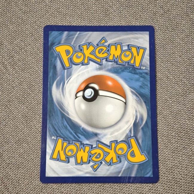 Scalpion 115/189 - Carte Pokémon - vue de dos Carte Pokémon Scalpion 115 /189 FR - fond bleu, état très bon