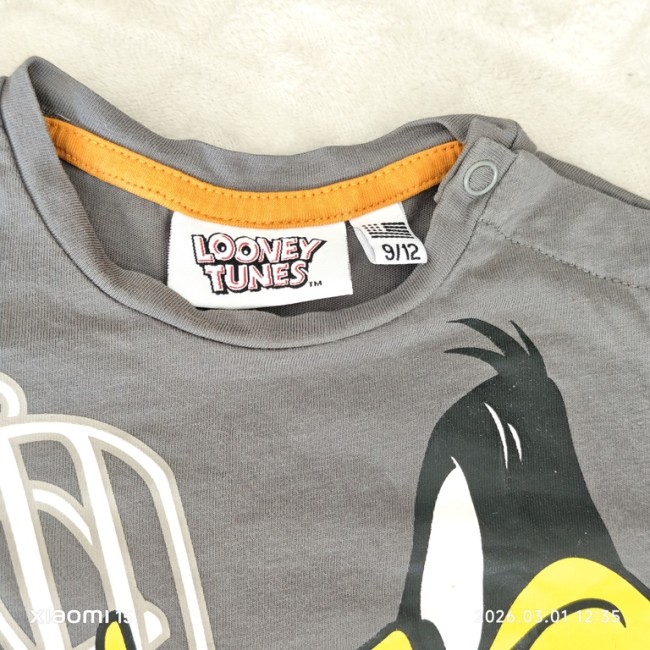 détail col t‑shirt Looney Tunes bébé 9‑12 mois