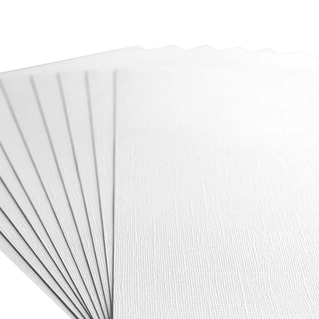 Gros plan sur le grain toilé du cardstock Florence A4 Blanc 097