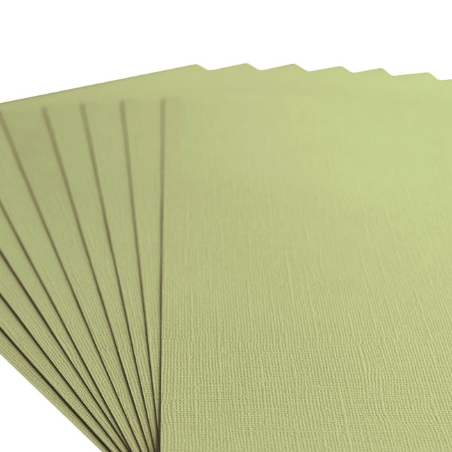 Florence • Cardstock texturé A4 Anise 066 — macro du grain Gros plan sur le grain toilé du cardstock Florence A4 Anise 066