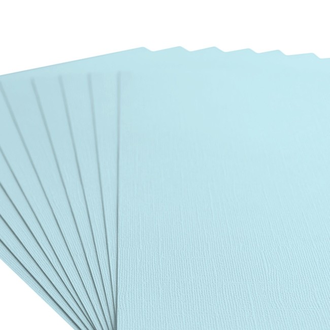 Gros plan sur le grain toilé du cardstock Florence A4 Ocean 045