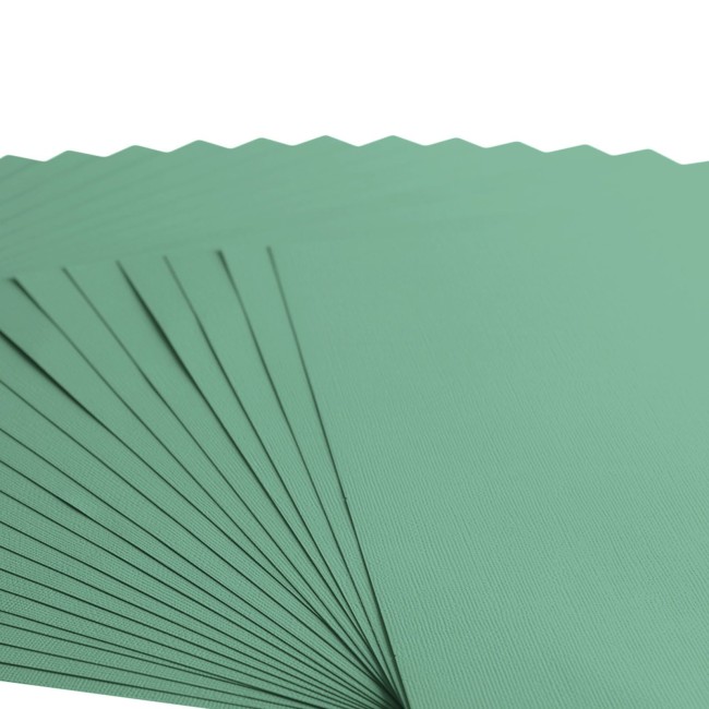 Florence • Cardstock texturé 30x30 Iguana 064 — macro du grain Gros plan sur le grain toilé du cardstock Florence 30x30 Iguana 064