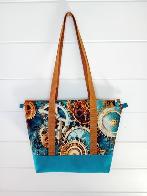 Sac Steampunk bleu canard à motifs de rouages | Les Cabas en folie Sac Steampunk bleu canard aux motifs de rouages et d’horlogerie