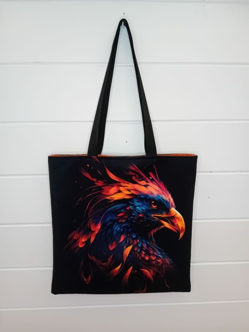 Tote bag Regard de Phénix avec portrait de phénix aux plumes bleues, rouges et orange, modèle unique dans les Vosges