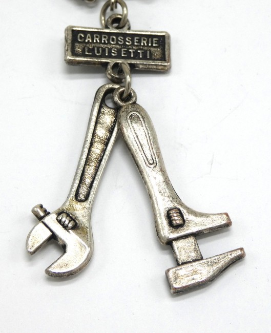 P1060087 Porte clé métal clé à molette publicitaire carrosserie Luisetti
