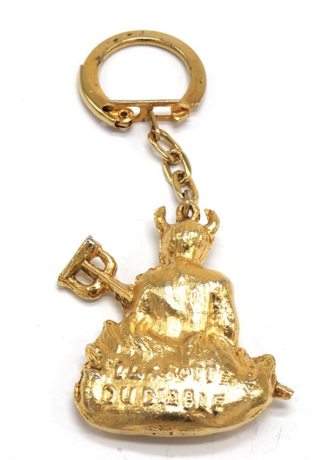 P1060182 Porte clé métal doré La grotte du diable