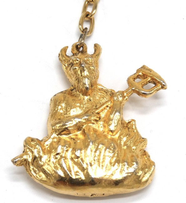 P1060184 Porte clé métal doré La grotte du diable