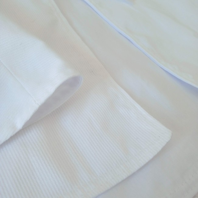 Cape de baptême blanche pour bébé en piqué de coton et doublure popeline blanche