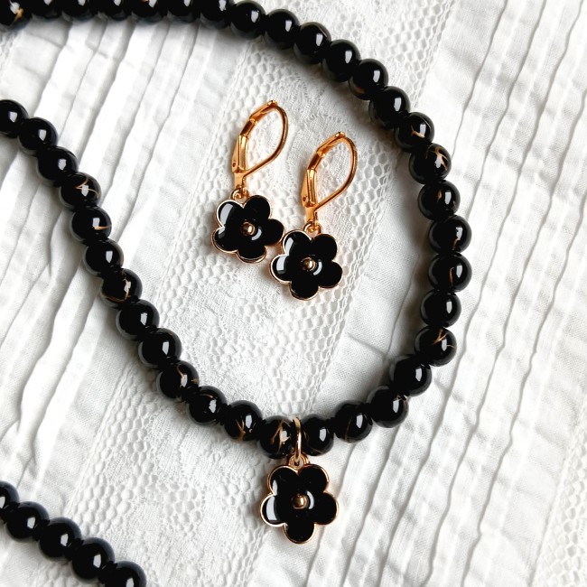 Demi-parure noire à la touche florale raffinée
