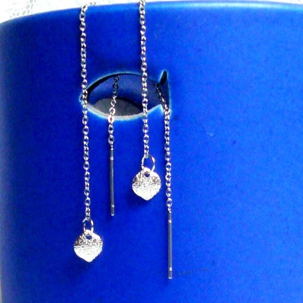 boucles traversantes apportant une touche d'élégance à n'importe quelle tenue.