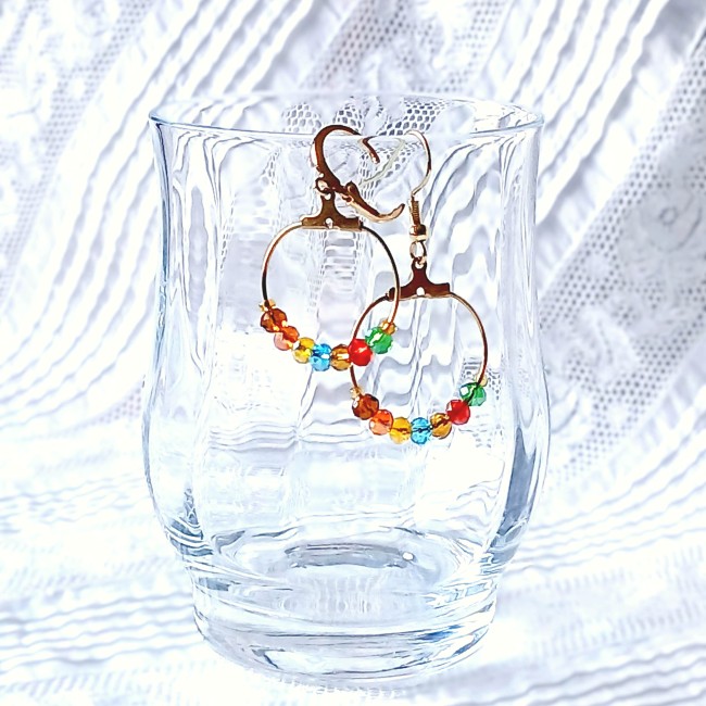 Créoles inox doré avec perles en cristal autrichien.