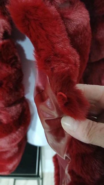 Manteau en fourrure à capuche