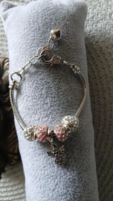 Bracelet  chaîne serpent et charm Ange rose