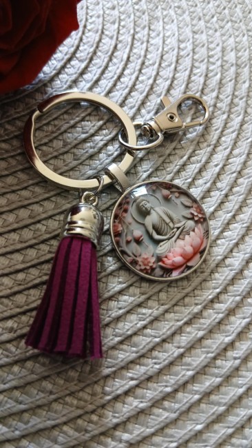 Porte clé Boudha et pompon 