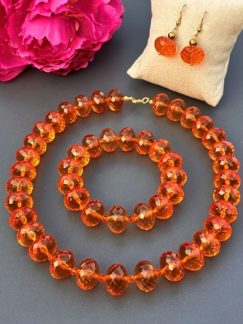 BELLA - Ensemble Collier, bracelet et boucles aux perles de bohème & perles de verre orange Parure 3 pièces fantaisie composée d'un collier d'un bracelet et de boucles d'oreilles aux grosses perles de verre oranges cristal pour un look bohème chic et solaire