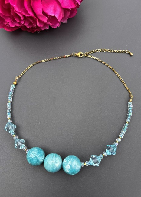  Collier bohème bleu aqua chic très esprit créateur, pièce unique  composé de grosse perles de bois au centre du bijou et de perles de bohème et de rocaille pour un style élégant et raffiné