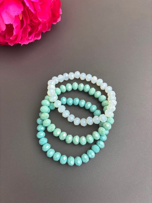 AURORA - Manchette de 3 bracelets perle de bohèmes lagon Manchette bohème chic composée de 3 bracelets de perles de bohème amande, turquoise, lagon pour un look glamour, tendance et chic