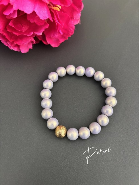 NAYA - Bracelet de perles soft touch pastel parme Bracelet fantaisie composé de perle touch soft parme au toucher de pêche pour une harmonie de couleurs pastels chic