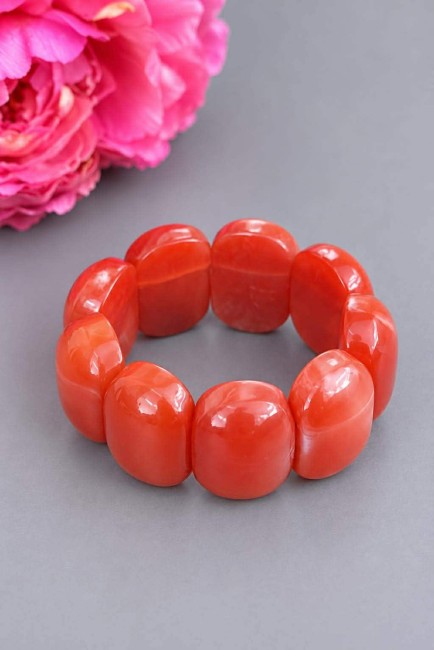 COLISEE - Bracelet résine avec gros maillons terracotta Bracelet fantaisie composée de gros maillon en résine terracotta arrondi qui épouse parfaitement le poignet et on adore ses reflets marbrés pour un style ultra moderne et chic