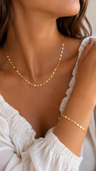 Parure OXANA composé d'un collier et d'un bracelet de pampilles en acier inoxydable doré pour un look bohème chic