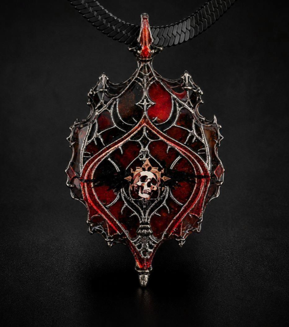 Détail pendentif gothique rouge noir crane bijou fait main