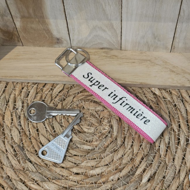 Porte clés message Super infirmière coloris rose foncé