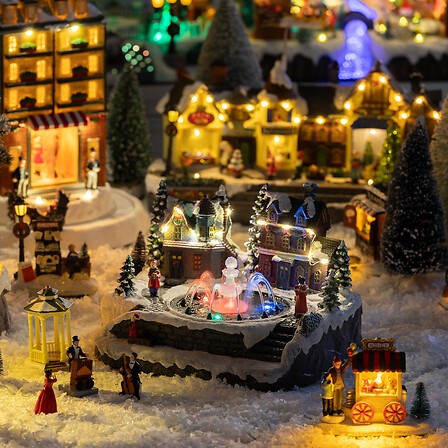 Village de Noël lumineux fontaine enfants 14 LED | Irisia Maison