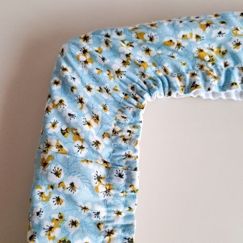 détails grime guard fleuri bleu