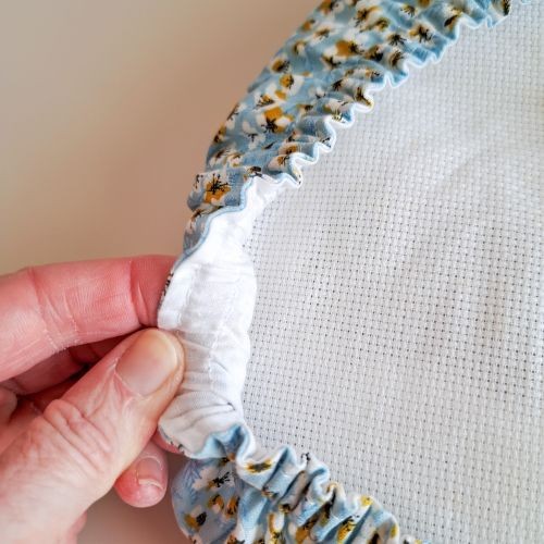 grime guard doublé avec un tissu uni blanc