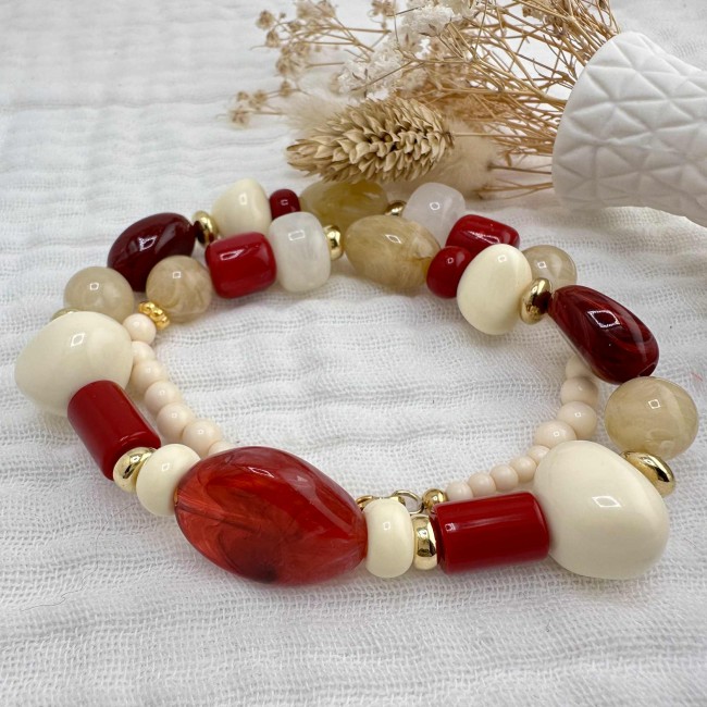 collier de créateur, grosses perles en résine rouge et acier inox doré, atelier proche de Bordeaux